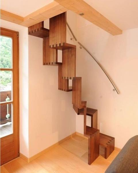 Stairs to the attic in a small house 478d85d916e922d95a854f2dd7f1b592