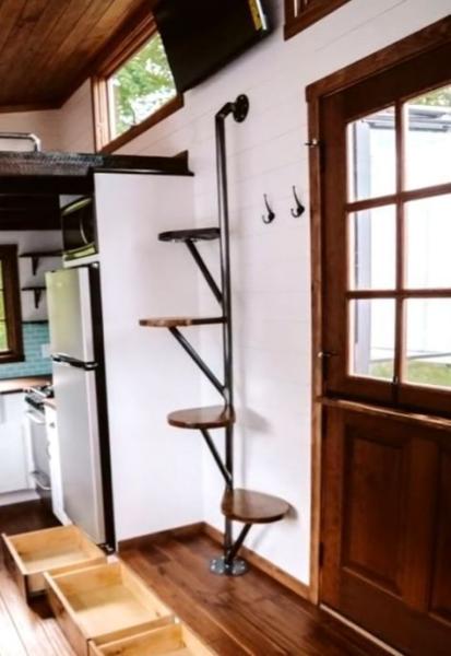 Stairs to the attic in a small house 526676d1bd9b62149d4fb7ce1252b0fc