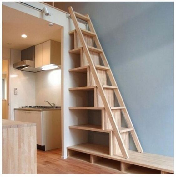 Stairs to the attic in a small house 93edf43be53440a80dff4cfee3c1f4c0